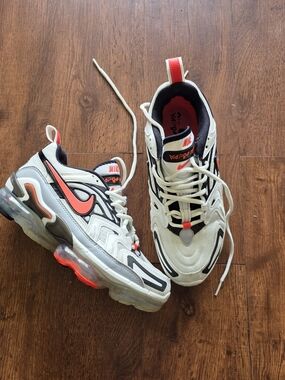 Nike Black Mesh Low-Top Sneaker with Red Heel Panel